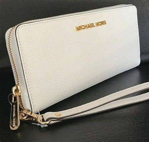 michael kors jet set continental wristlet|michael kors continental wristlet.